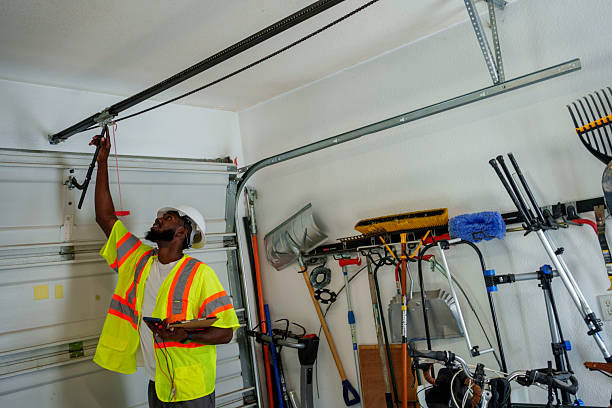 Professional Garage Door Panel Replacement technician working in Broad Creek, NC